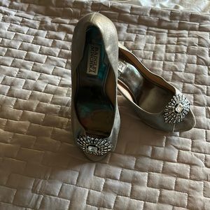 Badgley Mischka pewter heels with open toe embellishment.